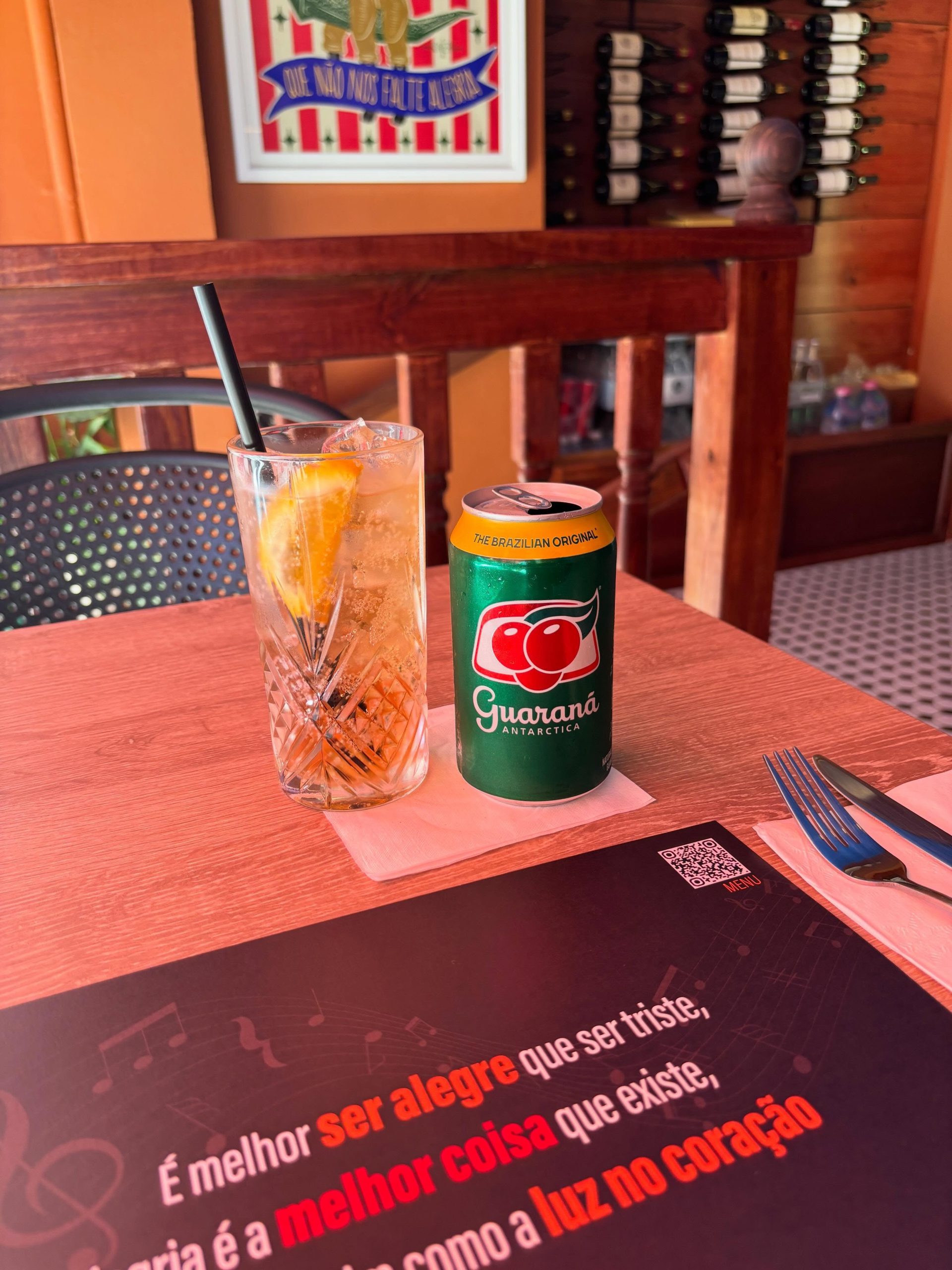 Guaraná and a drink on a table at Bossa Nova